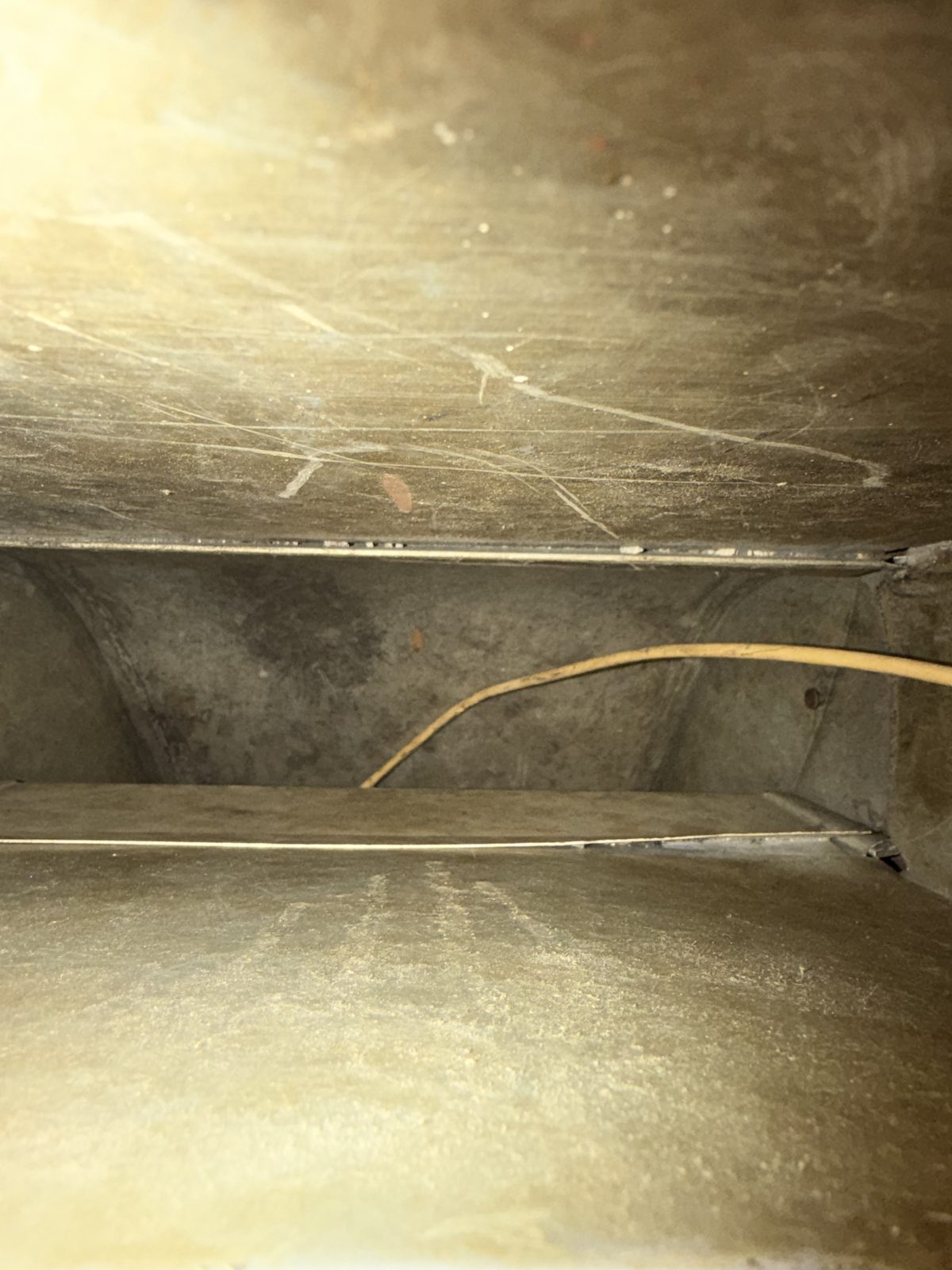 The same duct box after cleaning, the sheet metal clear