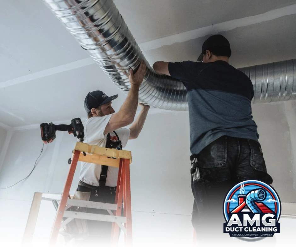 Technicians installing new air ducts to improve HVAC system efficiency and indoor air quality